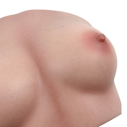 Realistic female breast with natural skin texture and subtle areola detail, designed for lifelike tactile experience.