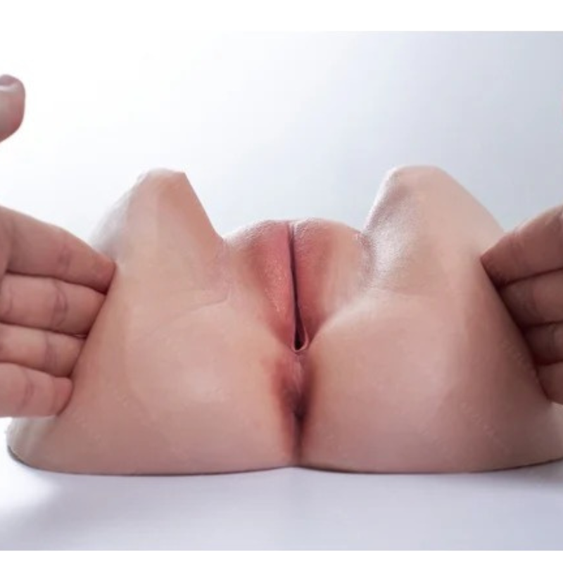Realistic male masturbator with soft silicone texture, natural skin tone, and detailed labial design for intimate pleasure.