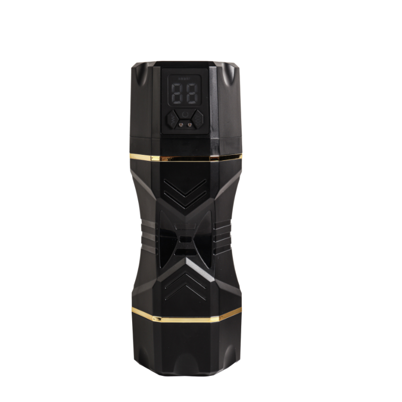 Black textured male masturbator with gold accents, digital display, and geometric grip design