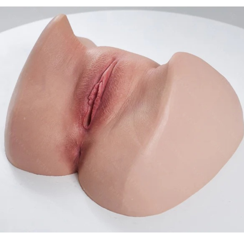 Realistic silicone male masturbator with detailed labia and natural skin texture