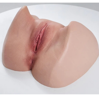 Realistic silicone male masturbator with detailed labia and natural skin texture