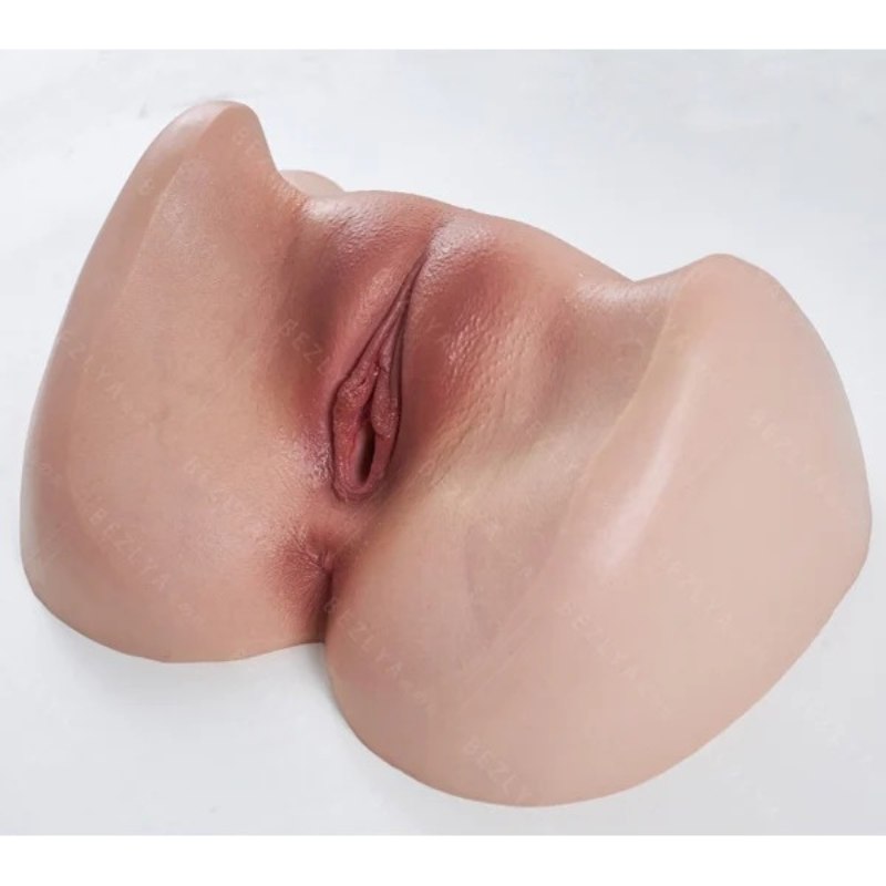 Realistic silicone male masturbator with detailed labia and natural skin texture