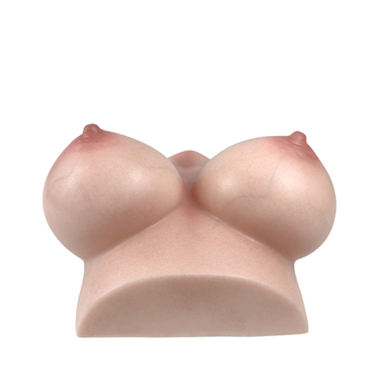 Realistic silicone breast-shaped male masturbator with natural skin texture and nipple details