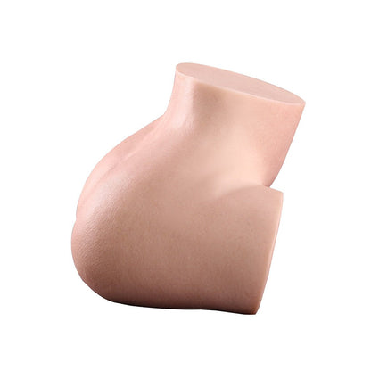 Realistic flesh-toned male masturbator with smooth, curved contours and lifelike texture for intimate pleasure.