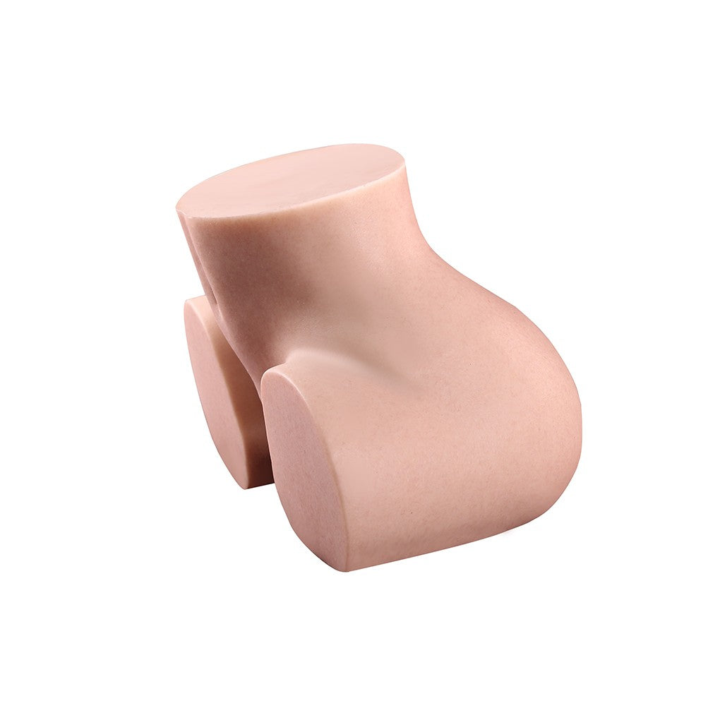 Flesh-toned male masturbator with curved, ergonomic design and soft silicone texture for realistic sensation
