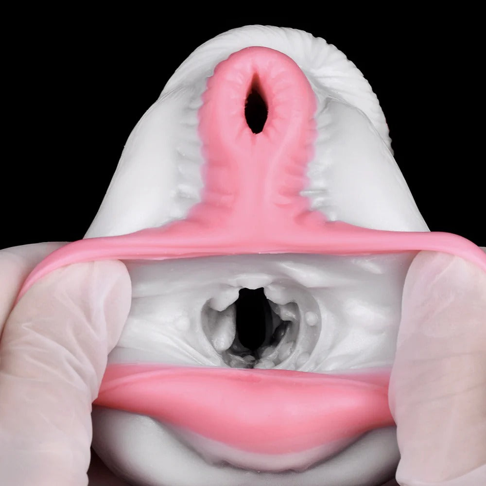 Realistic pink and white silicone male masturbator with detailed vaginal and anal openings, held by gloved hands