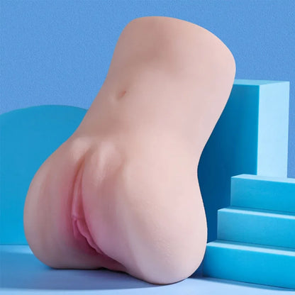 Realistic silicone male masturbator with natural skin texture and pink labia details, displayed on blue geometric blocks.