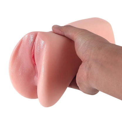 Hand holding realistic pink silicone male masturbator with detailed labia and soft texture