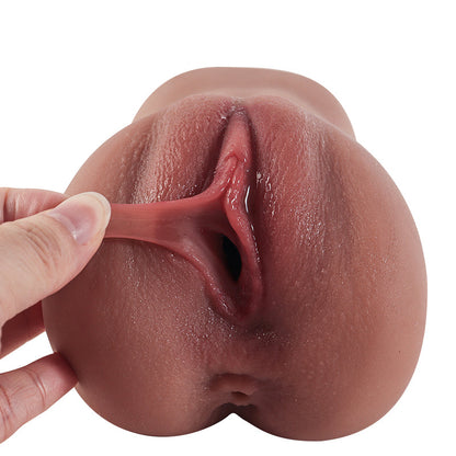 Realistic silicone male masturbator with detailed vaginal canal and natural skin texture