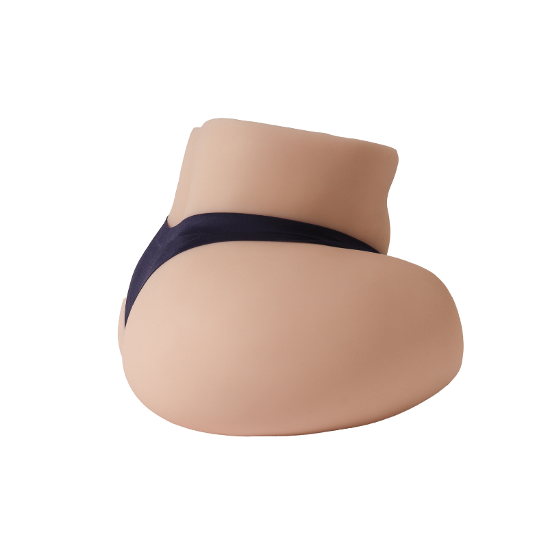 Realistic flesh-toned male masturbator with detailed labia and dark inner texture, designed for lifelike sensation.