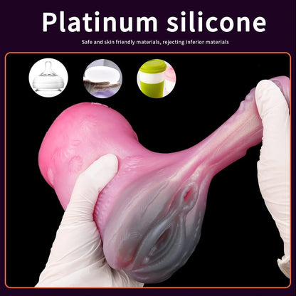 Pink silicone male masturbator with realistic texture, held by gloved hands, showcasing soft, stretchy material