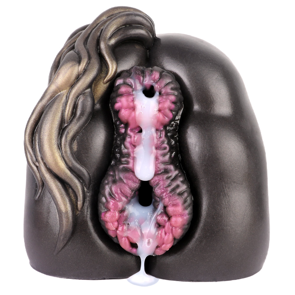 Realistic male masturbator with detailed pink interior, black exterior, and gold hair accent, featuring textured walls and dual openings.