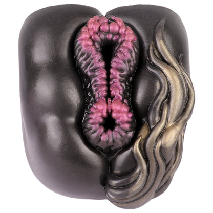 Realistic male masturbator with deep pink textured interior and metallic gold flame detailing on black exterior