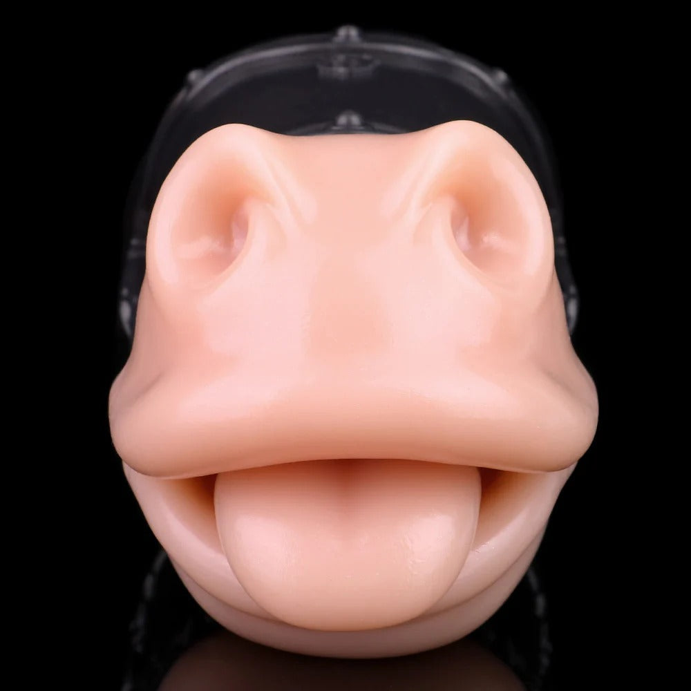 Realistic flesh-toned male masturbator with detailed labia and tongue-like texture, mounted on clear base