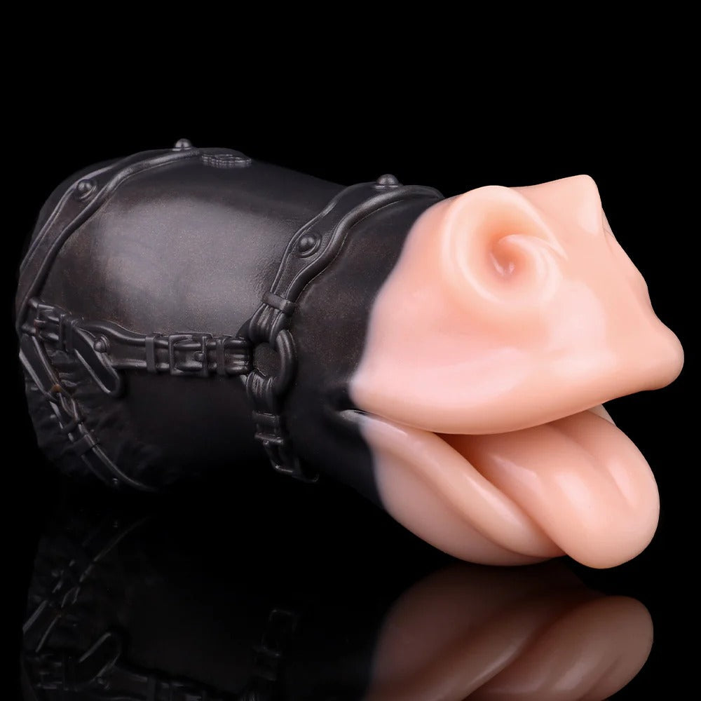 Realistic flesh-toned oral stimulator with black harness, smooth texture, detailed lips and tongue